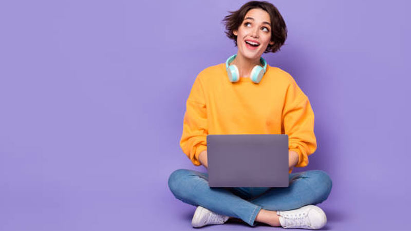 Youth sitting at Laptop